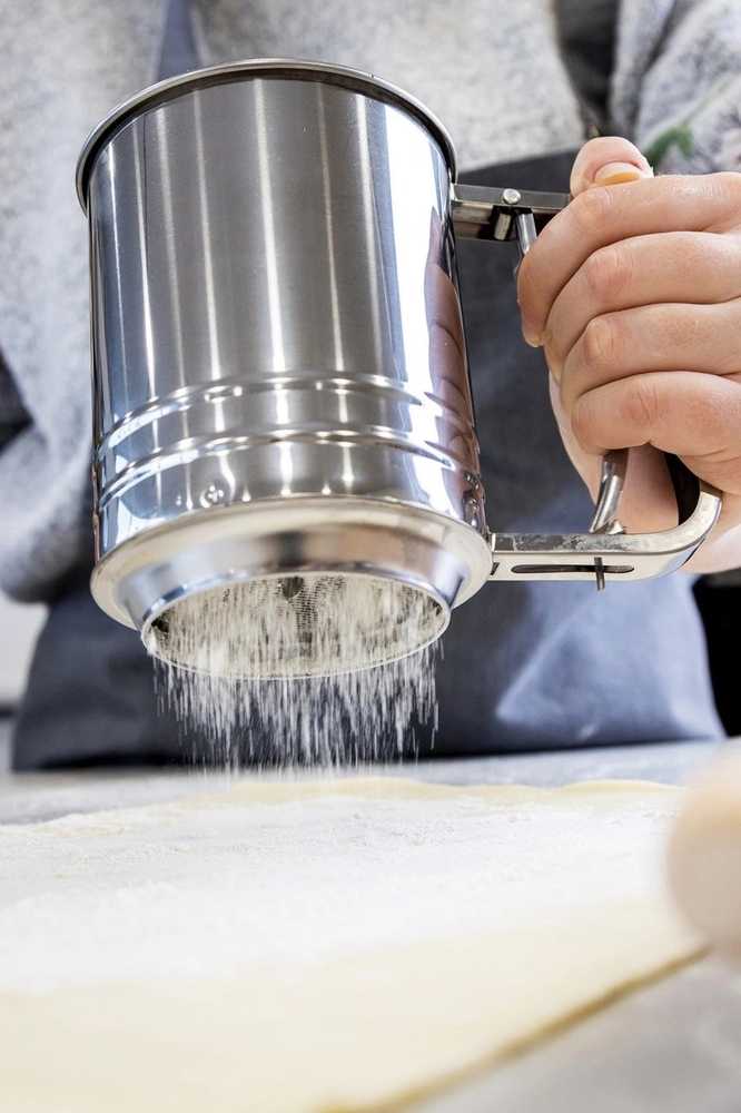 KitchenCraft Sítko a pákovým mechanismem