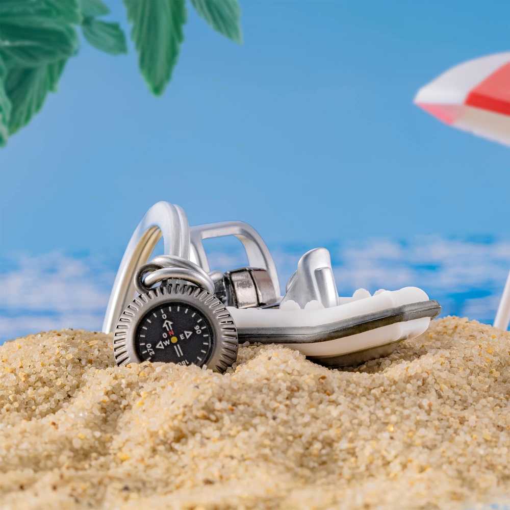 MTM Klíčenka s motorovým raftem a kompasem